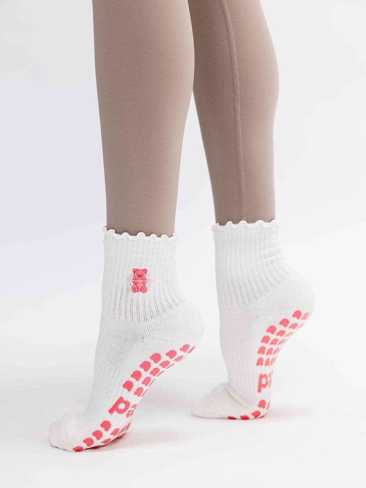 Pink Gummy Bear on Ruffled Cream Pilates Grip Sock